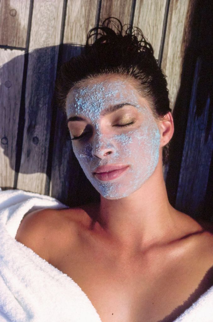Vogue, December 01, 1989 - Model relaxes with a face mask on at Cal-a-Vie Spa in San Diego, California. She wears a white terry cloth robe. Hair and makeup by Giorgio for Suga Salon, NYC. (Arthur Elgort/Conde Nast via Getty Images)