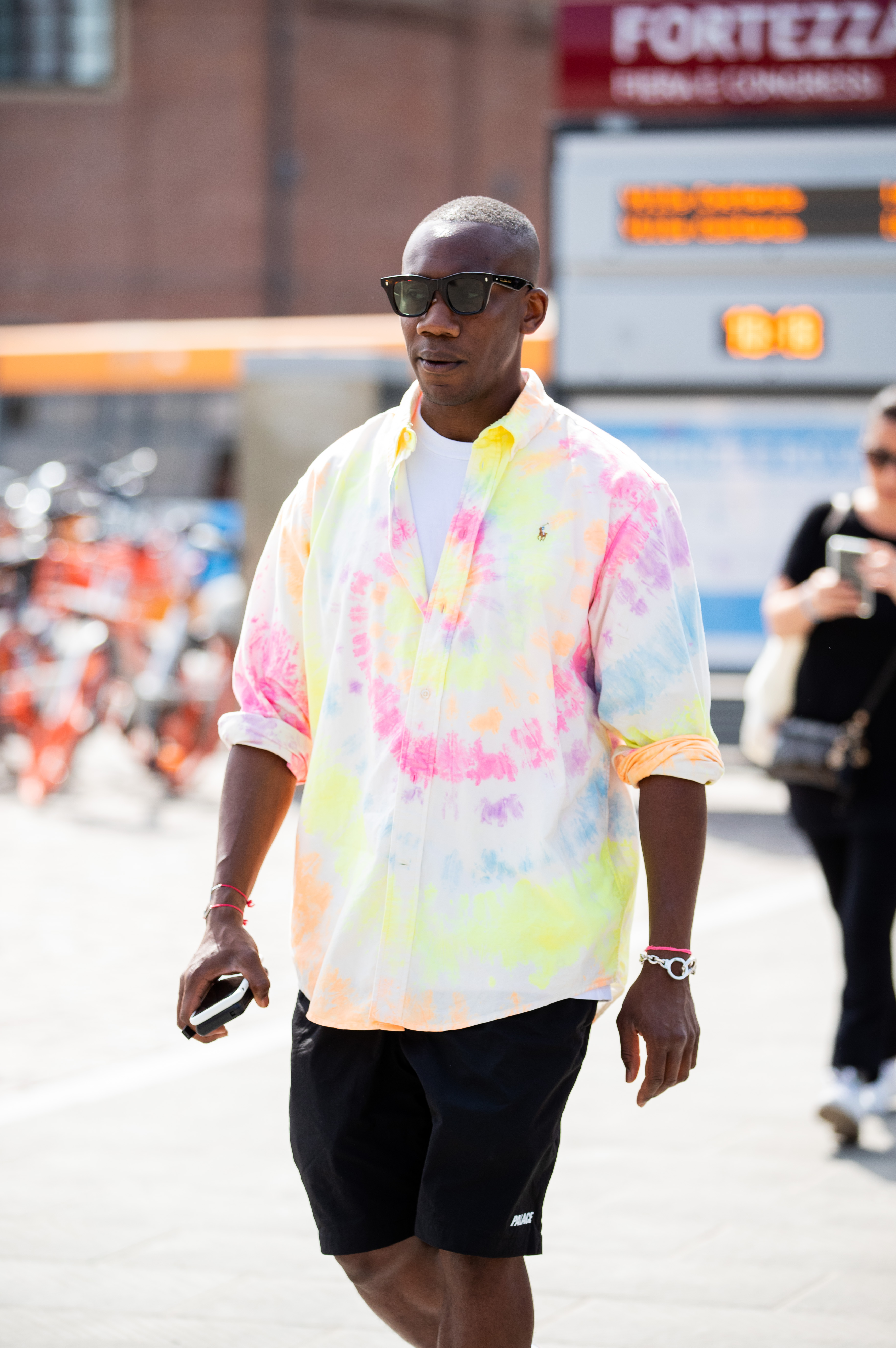FLORENCE, ITALY - JUNE 12: A guest is seen wearing multi colored button shirt, black shorts during Pitti Immagine Uomo 96 on June 12, 2019 in Florence, Italy. (Photo by Christian Vierig/Getty Images)